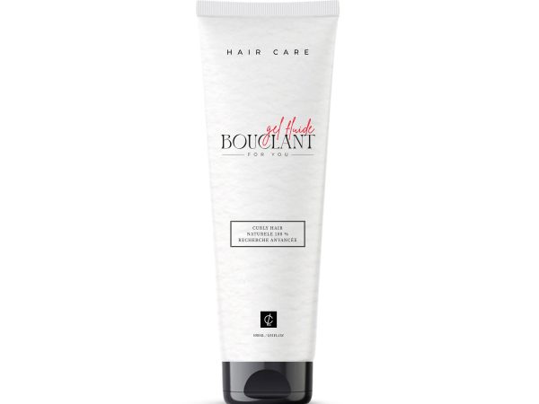 Tube de Bouclant gel fluide de la gamme Hair Care, un soin capillaire professionnel pour cheveux bouclés, présenté dans un packaging blanc épuré avec des accents rouges.